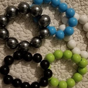 Set if 5 stretchy bracelets - black, lime, white,